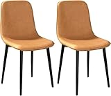 Confort luxueux : ces chaises de salle à manger rembourrées sont fabriquées avec un tissu en fausse fourrure pelucheuse et un rembourrage épais, offrant une expérience d'assise confortable et accueillante.
