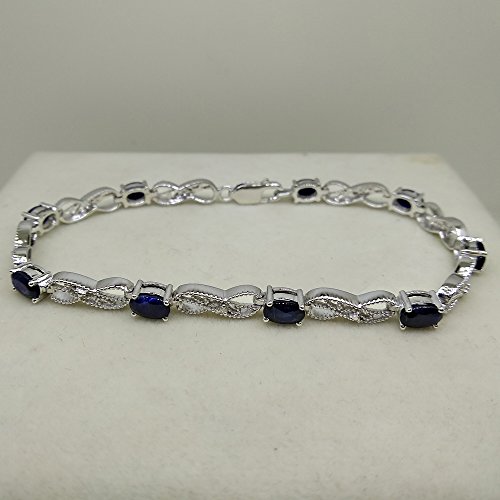 Dazzlingrock Collection Oval Cut Blue Sapphire & Round Cut White Diamond Ladies Infinity Link Tennis Bracelet, Sterling Silver #TOP3