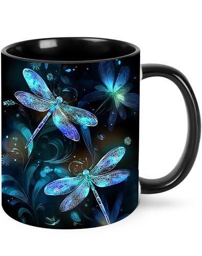 White porcelain mug printed with a dragonfly design, with a looped handle, on a kitchen counter