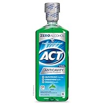 ACT Enjuague bucal con fluoruro anticaries sin alcohol, menta, 18 oz, ayuda a prevenir las caries, fortalecer el esmalte dental y refrescar