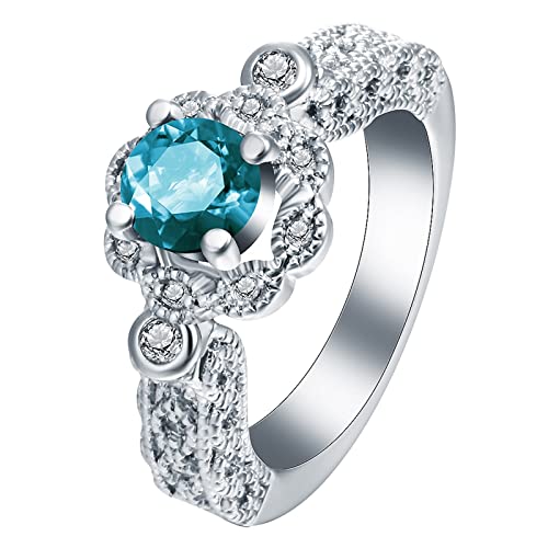Bague de fiançailles zircone bleue creuse contre l'inconfort des doigts