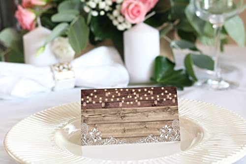 Tented Farmhouse Wedding Place Cards. Set Of 50 Rustic Wedding Table Cards. Ideal For Weddings, Celebrations, And Buffets. Warm Glowing String Lights And Lace Over Weathered Wood Background. 2"X3.5". #TOP7