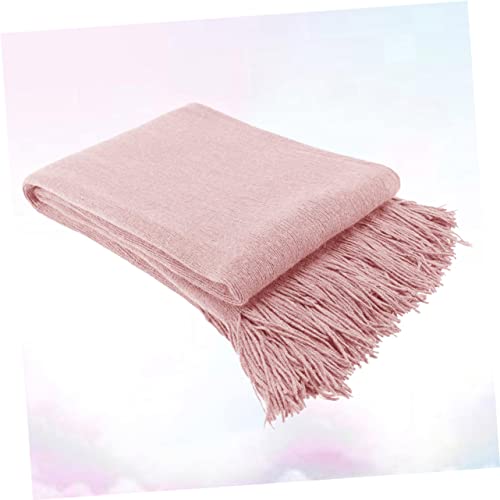 Couverture tricotée style nordique rose pour un nid douillet