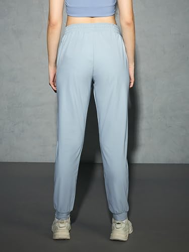 Image of TECHNOSPORT Womens Mid Rise Polyester Regular Fit Solid Jogger for Running, Workout & Sports