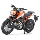 Bburago - KTM 250 Duke, motocykl diecast w skali 1:18, szczegółowa replika w pomarańczowo-czarnej kolorystyce, sportowy design, oficjalna licencja KTM, zalecany wiek 3+ lata