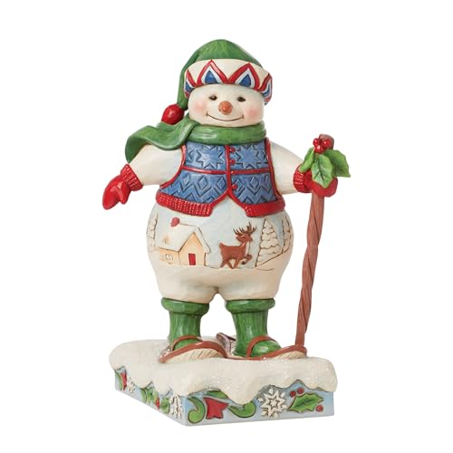 Enesco Jim Shore Heartwood Creek Snowman Wearing Snowshoes Figurine- Resin Hand Painted Crafted Collectible Decorative Figurines Christmas Home Decor Sculpture Holiday Shelf Mantel Statue Gift, 7 Inch