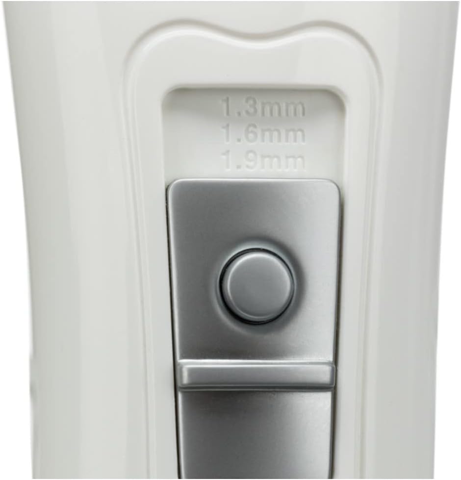 Close-up of cutting length adjustment switch on Trixie TR1150 clipper