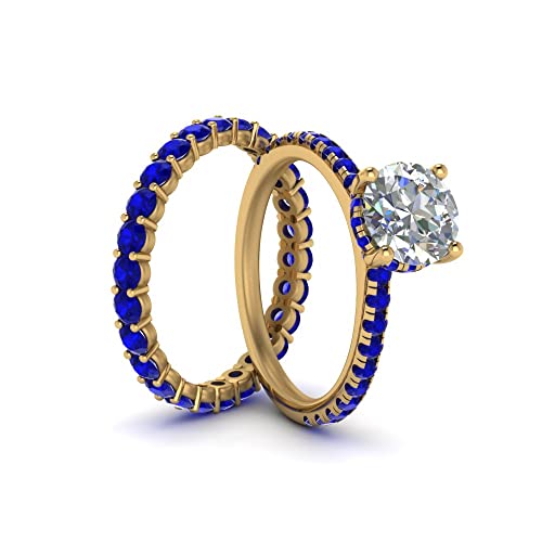 Bague en diamant halo caché or jaune et anneaux de mariage en pierres précieuses
