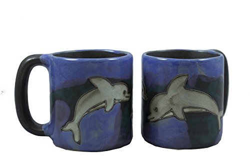 Hand-painted stoneware coffee mug with a dolphin design in blue and white glaze, 16 ounces