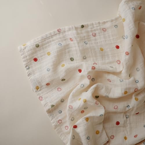 Image of mushie Muslin Baby Swaddle Blanket | 100% Organic Cotton (Smiley Face)
