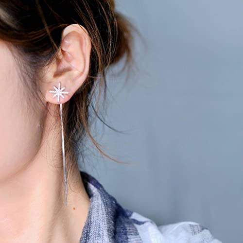 Boucles d'oreilles à pompon et étoile en argent, le cadeau idéal