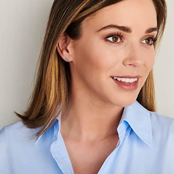 Miore SA913E - Pendientes de oro blanco de 9 quilates con diamante (.114) con cierre de mariposa a presión