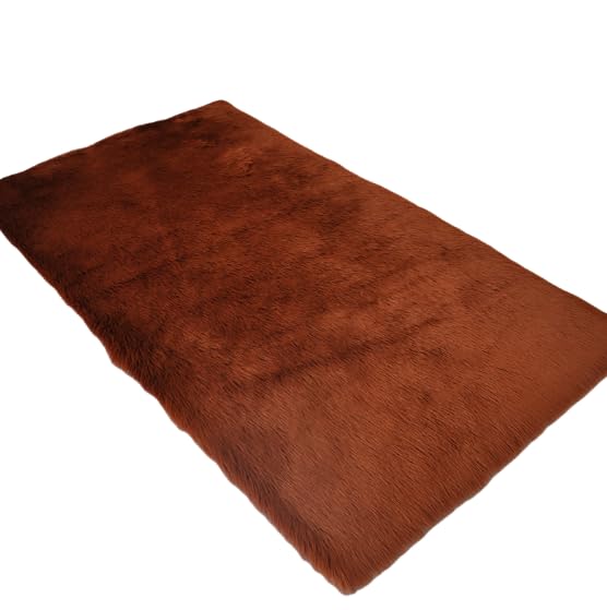 Tapis en peluche couleur café pour créer une ambiance cocooning dans la chambre