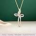 Jewelili Diamond Cross Pendant Necklace for Women | 10K Yellow Gold | 1/5 CTTW Natural White Diamonds | 18” Rope Chain | Religious Jewelry with Gift Box | Timeless Fashion Jewelry Gift for Her