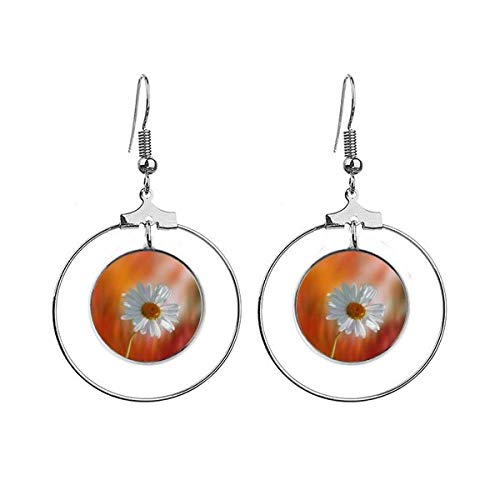Boucles d'oreilles créoles en métal argent avec de délicates fleurs orange