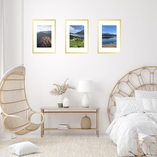 Image of JCJMY 11x17 Picture Frame Gold with 8x10 Mat, Display Photo 8x10 with Mat or 11 x 17 Without Mat, Wall Hanging Large 11x17 Poster Frame with Shatter Resistant Plexiglass, Gold
