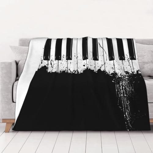 Couverture en flanelle piano 200x150 cm douce et chaude pour canapé