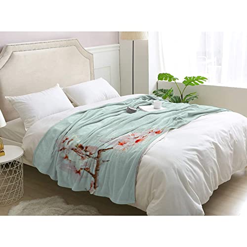 Couverture Polaire Fleurs de Cerisier pour Vos Soirées Cocooning sur le Canapé