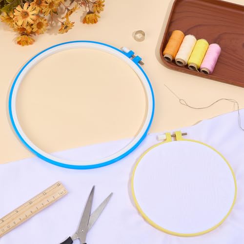 Image of GORGECRAFT 2 Sizes Spring Tension Embroidery Hoop Cross Stitch Tension Hoop Blue Yellow Round Plastic Frame Darning Shed Rings for Embroidery Cross Stitch Sewing DIY Projects (5.6in, 8.23 x 8.9in)