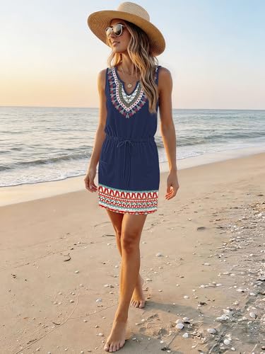 Image of SAUKOLE Womens Sleeveless T Shirt Dresses Casual Cute Floral Print Short Dress Summer Fashion Front Pockets