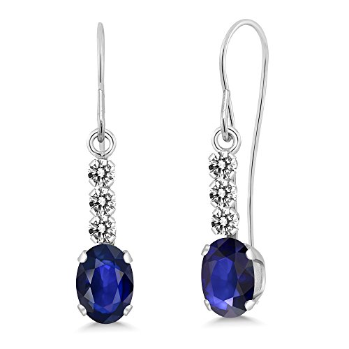 Gem Stone King 10K White Gold Blue Sapphire and White Diamond Drop Dangle Earrings For Women (1.10 Cttw, Gemstone September Birthstone, Oval 6X4MM)