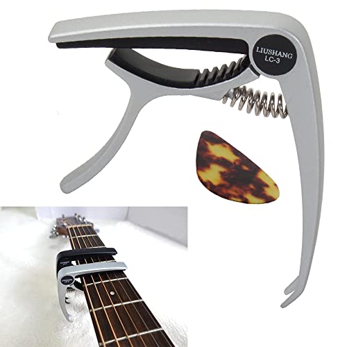 Ducomi Capodastre guitare acoustique + 1 médiator – Capodastre professionnel pour cordes guitare classique, ukulélé… - Les Beatles, Paul McCartney, John Lennon, RIngo Starr, George Harrison Ducomi Capodastre guitare acoustique + 1 médiator - Capodastre professionnel pour cordes guitare classique, ukulélé…