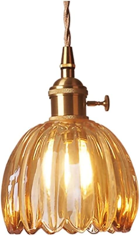 Lampe suspendue en cuivre pour sublimer votre escalier d'entrée chaleureux