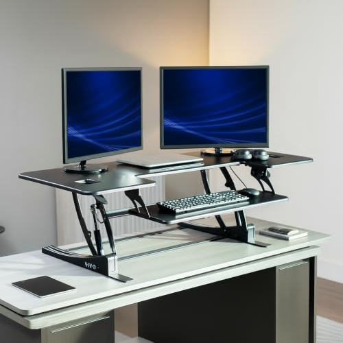 Image of VIVO 54 inch Manual Height Adjustable Large Standing Desk Converter, Quick Sit-Stand Desk Riser, Tabletop Pneumatic Assist Height Adjust 6.5 to 17 inch, Black, DESK-V054V