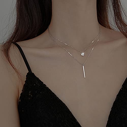 Collana lunga in argento con catena e perle ovali