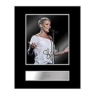Pink Signed Mounted Photo Display Professionally mounted 10x8 inch Photo display with caption. Perfect gift, ready to be framed. High quality photographic print applied to a 1.5mm thick black bevelled mount. The autographs are Digitally pre-printed. ...
