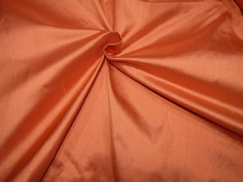 Soie Dupion orange 137 cm : texture rigide pour volumes parfaits