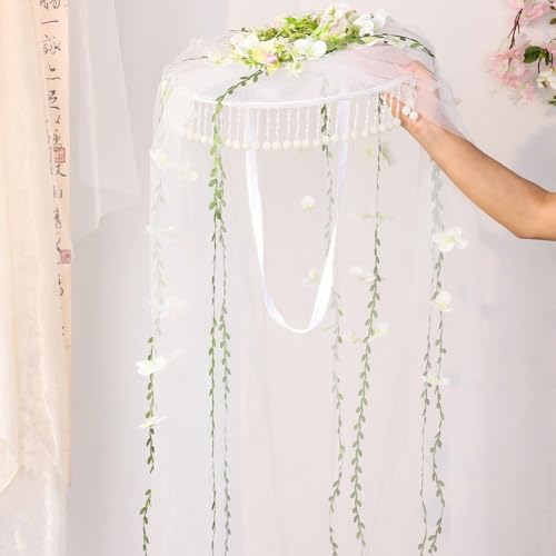 Chapeau à voile fleuri doté d'un rideau à pompons perlés traditionnels
