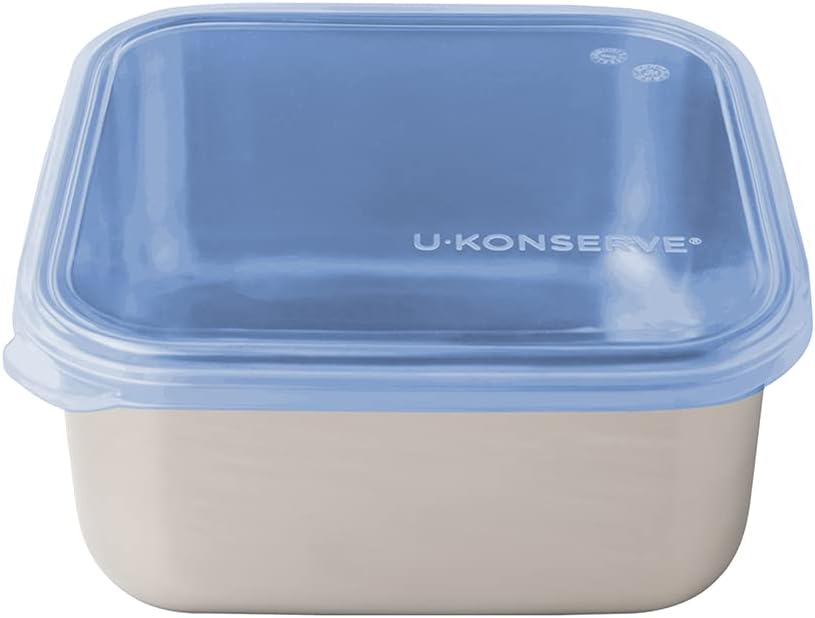 A set of three U-Konserve round nesting stainless steel containers with colorful lids.