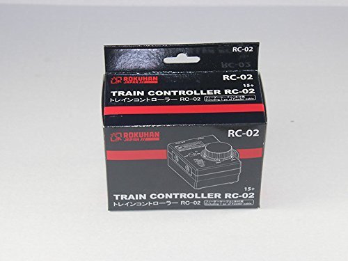 Top view of Rokuhan RC02 Compact Controller showing speed knob and direction switch