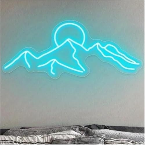 Lampe néon montagne contre les pièces sombres avec lumière colorée