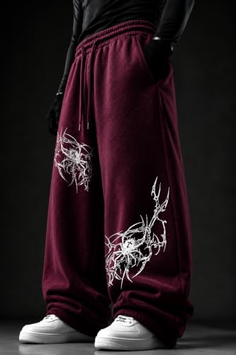Image of Aesthetic Gothic Wide Leg Pants for Men | Tribal Print Baggy Streetwear | Oversized Track Pants with Elastic Waist | Black and White Relaxed Fit Bottoms