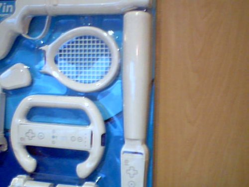Zenex on the Move Wii Gaming Accessories 7-in-1 Sports Pack Blister Package Version Model#301-9713 for Nintendo Wii System---comes with Wii Tennis Racquet, Wii Golf Club, Wii Baseball Bat, Wii Pistol, Wii Steering Wheel, Wii Remote Grip, & Wii Remote Handle---user Friendly Snap-in Design Comfortable Converts Wii Controller Into 6 Different Gaming Kits---each of the Sets Are for Use with Compatible Wii Console Game. The Accessories Set Help Simulate the Corresponding Game Actions. (Nintendo Wii System Console Version)