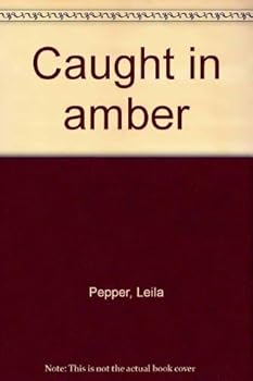 Paperback Caught in amber Book