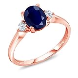 Gem Stone King 10K Rose Gold Blue Sapphire and White Created Sapphire 3-Stone Women's Engagement...