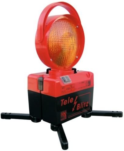 Tele-flash with battery 6 V including charging adapter, on one side.