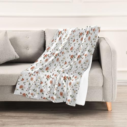 Plaid canapé rose et blanc idéal pour vos soirées