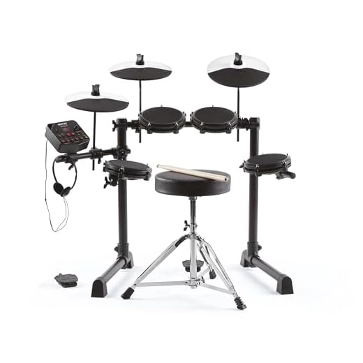 Alesis Debut Kit - Batería electrónica infantil con 4 parches de malla, 120 sonidos, 100 lecciones, taburete, baquetas, llave de batería y auriculares