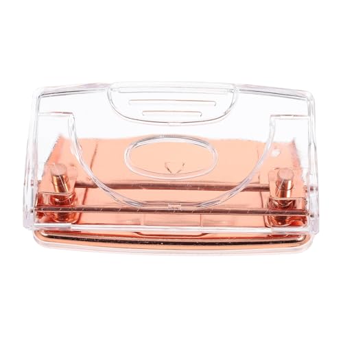 Perforadora transparente oro rosa con diseño portátil y minimalista