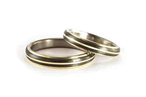 Yellow gold, titanium and carbon fiber wedding bands. Unique design titanium and 18K gold black wedding ring set (00559_4N4N)