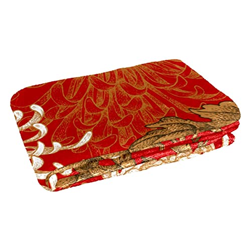 Couverture chaude fleurie pour des moments cocooning sur le canapé