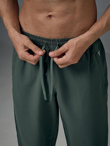 Image of TECHNOSPORT Mens Regular Fit Solid Woven Track Pant for Activewear, Regular Use and Quick Dry, (Non- Stretchable)