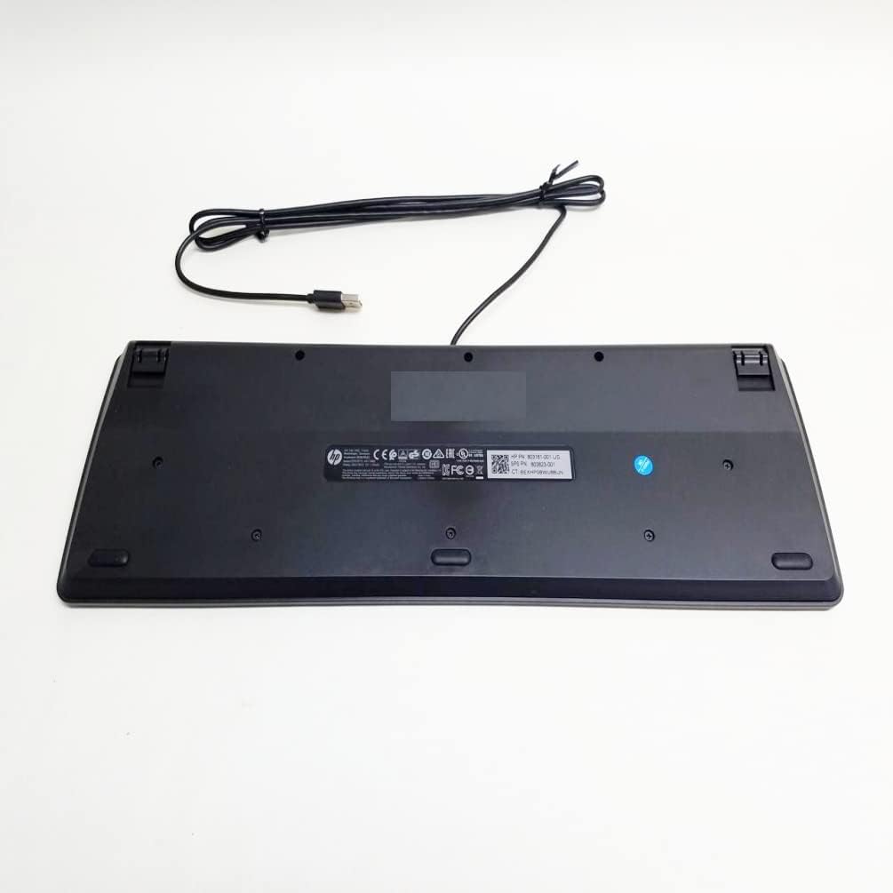 Underside view of the black wired USB slim keyboard, showing the product label and adjustable feet.