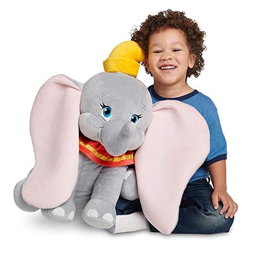 Disney Store Grande peluche Dumbo, 58 cm, personaggio iconico in posizione seduta con dettagli ricamati e orecchie 3D, adatto a tutte le età