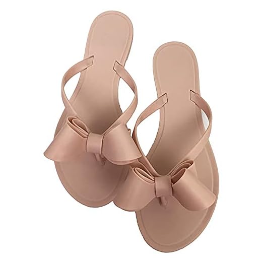 Mtzyoa Women Flip-Flops Bow Sandals Beach Flat Nude Rivets Rain Jelly Sandals (Nude, numeric_6_point_5)