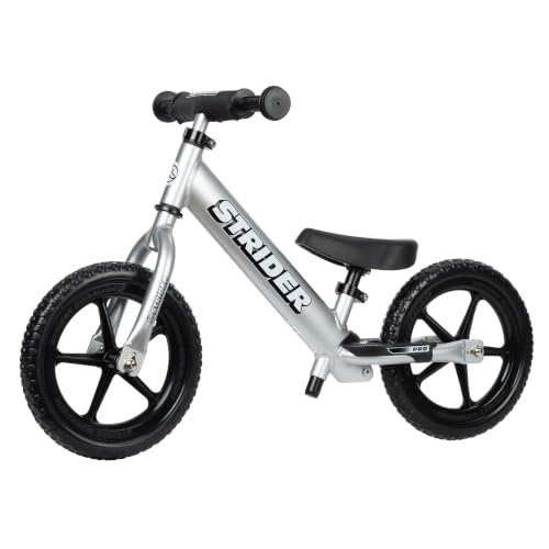 Image of Strider 12 Pro Bike, Silver - No Pedal Balance Bicycle for Kids 1 to 5 Years - Includes Safety Pad, Padded Seat, Mini Grips, Flat-Free Tires Easy Assembly Tool-Free Adjustments